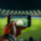 Mobile device displaying a live cricket match