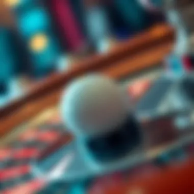 A close-up of a Roulette wheel with a ball poised to drop.